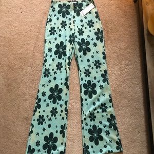 Flower teal and green flare pants. Size small. Never worn, urban outfitters.